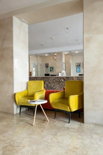 Un lugar para sentarse en Hotel Etoile Du Nord