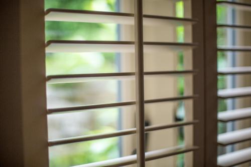 a window with japanese blinds on it at Robin Hood Farm B&B in Baslow