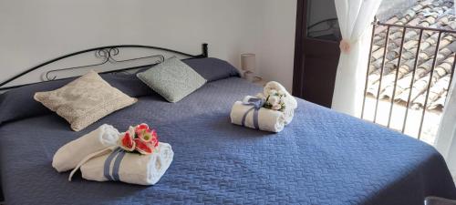 Posteľ alebo postele v izbe v ubytovaní Casa Vacanze dalla Nonnina