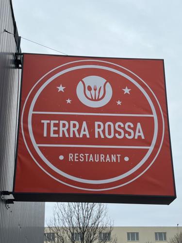 a red sign for a russian restaurant at Luxury apartment 1 Free Underground Secure Parking in Pazardzhik