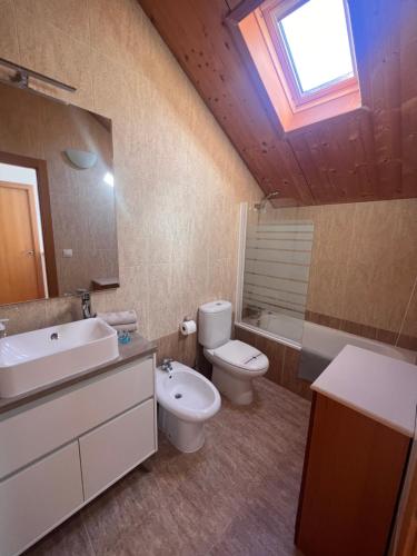 Ένα μπάνιο στο Apartamento Luga