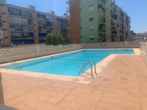 Bazén v ubytování Coqueto apartamento junto a la playa. nebo v jeho okolí