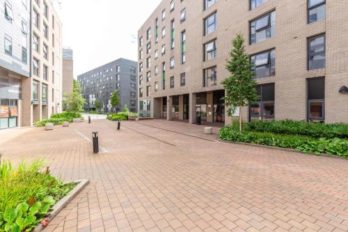a brick sidewalk in front of a building at Ensuite Bedrooms with Shared Kitchen and Studios at Marshall Court in Newcastle in Newcastle upon Tyne
