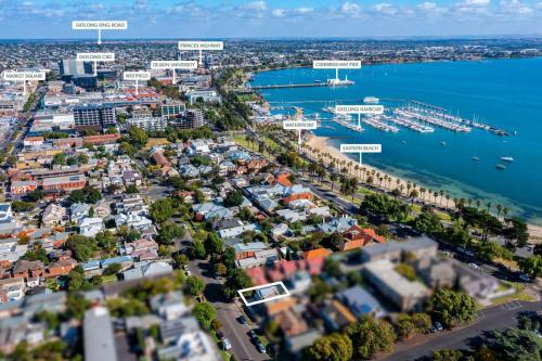 an aerial view of a city with a harbor at Eastern Beach Retreat in Geelong