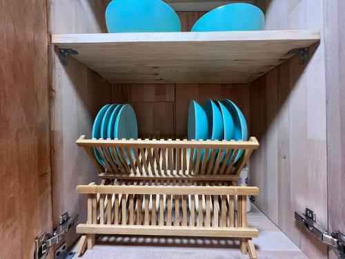 a group of blue and white surfboards in a room at Politkovskaia Apartment Tbilisi in Agaraki