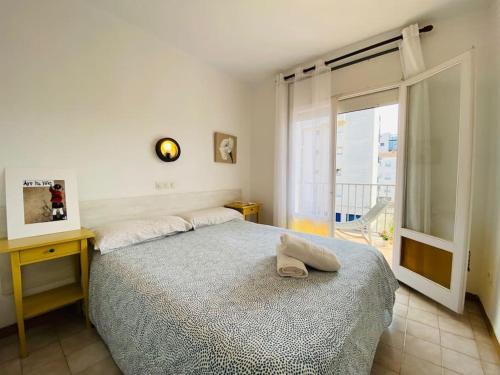 Postel nebo postele na pokoji v ubytování APARTAMENTOS AQUARIUM (2B). MUY CERCA DE LA PLAYA.