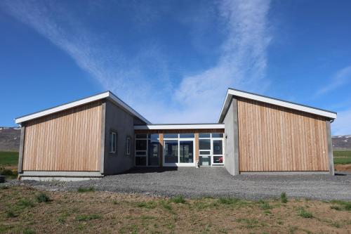 a rendering of a house with two buildings at Glaumbær III in Varmahlid