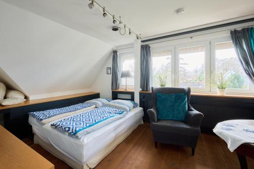 Ferienwohnung Ostseeperle Moba-Travel tesisinde bir odada yatak veya yataklar