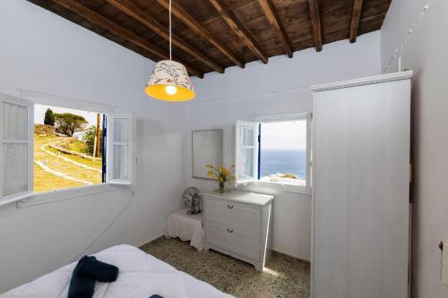 Postel nebo postele na pokoji v ubytování Pauvre Maison with sea View