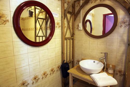 Ванна кімната в Auberge Cocagne
