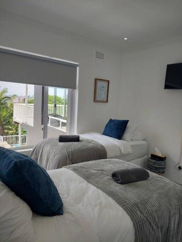 Ένα ή περισσότερα κρεβάτια σε δωμάτιο στο Harbour View House