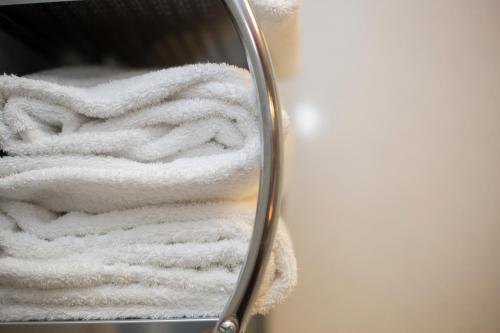 a stack of towels reflected in a mirror at Redesdale Arms in Otterburn