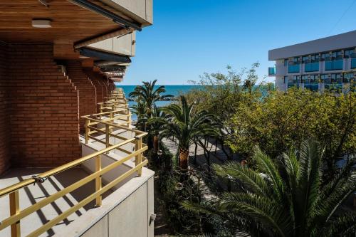 a balcony with a view of the ocean at Apartamentos Marina sol de España in Cambrils