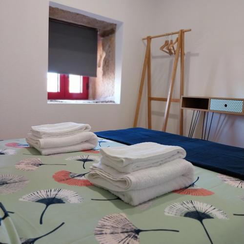 Ένα ή περισσότερα κρεβάτια σε δωμάτιο στο Douro Feels Like Home