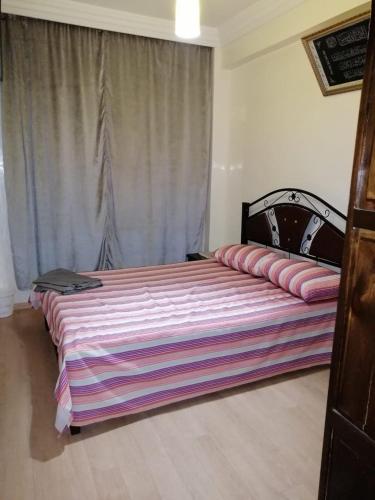 Postel nebo postele na pokoji v ubytování Mohammed V Airport HOME