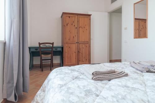 Ένα ή περισσότερα κρεβάτια σε δωμάτιο στο Agriturismo Case al Sole