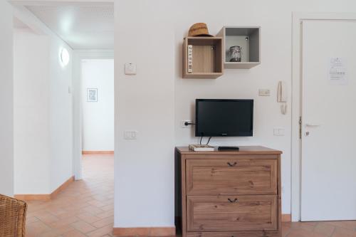 Μια τηλεόραση ή/και κέντρο ψυχαγωγίας στο Agriturismo Case al Sole