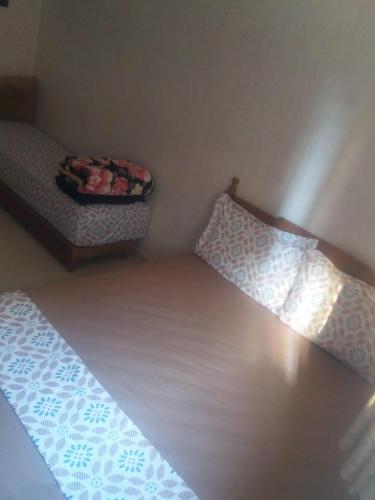 Postel nebo postele na pokoji v ubytování Mohammed V Airport HOME