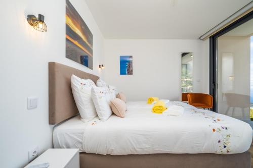 Ένα ή περισσότερα κρεβάτια σε δωμάτιο στο Villa Camelia