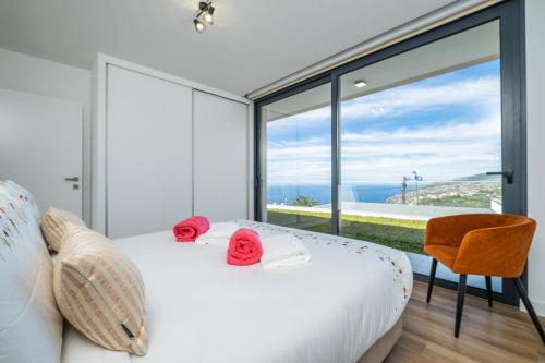 Ένα ή περισσότερα κρεβάτια σε δωμάτιο στο Villa Camelia