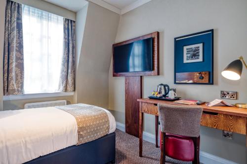 a hotel room with a bed and a desk at Toby Carvery Edinburgh West by Innkeeper's Collection in Edinburgh