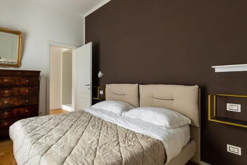 Ένα ή περισσότερα κρεβάτια σε δωμάτιο στο Cinquantacinque