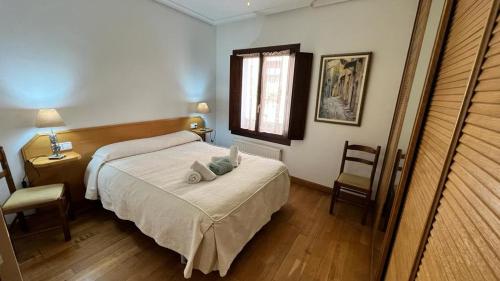 Postel nebo postele na pokoji v ubytování Pensión Buen Camino