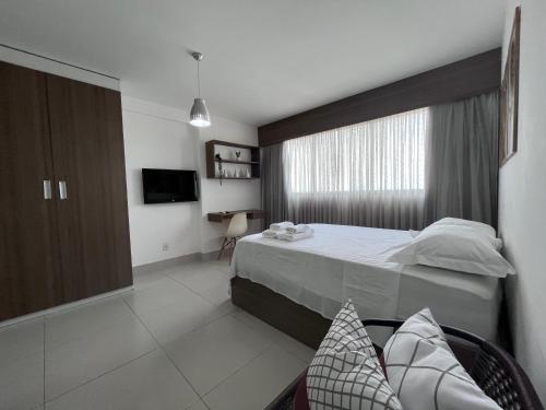 Postel nebo postele na pokoji v ubytování Beach Class Ilha do Leite - Recife