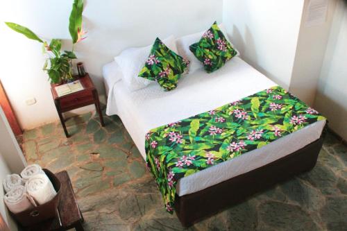 Postel nebo postele na pokoji v ubytování Hotel del Campo