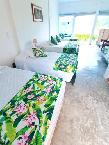 Postel nebo postele na pokoji v ubytování Hotel del Campo