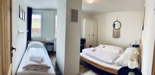 Cama o camas de una habitación en Chalupa Bořanovice