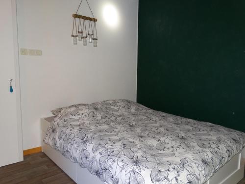 Posteľ alebo postele v izbe v ubytovaní Grand appartement paisible et confortable