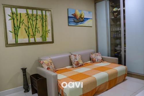 En eller flere senger på et rom på Qavi - Flat em Resort Beira Mar Cotovelo #InMare57
