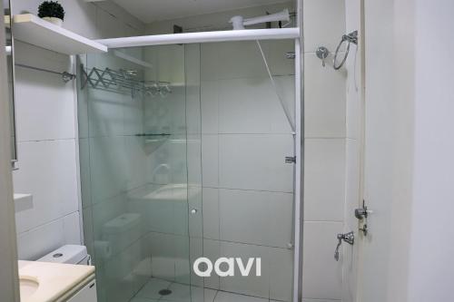 a shower with a glass door in a bathroom at In Mare Bali Resort Beira Mar by Qavi - 57 in Parnamirim