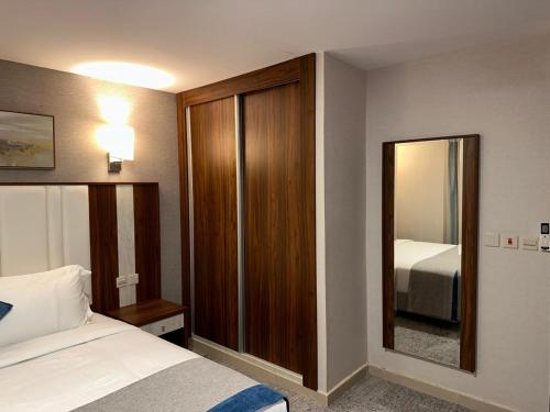 Postel nebo postele na pokoji v ubytování Sweet Home For Serviced Accommodation