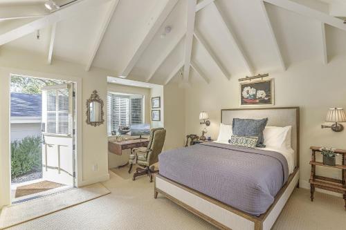 a bedroom with a bed and a desk at 3884 Twenty-One Oaks home in Carmel