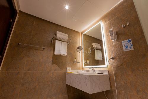Ванная комната в دانة المروج للشقق المخدومة Danat Almourouj Serviced Apartment
