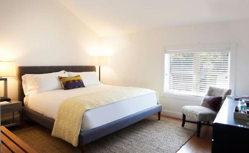 Ein Bett oder Betten in einem Zimmer der Unterkunft ZEY HOTEL
