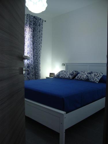Postel nebo postele na pokoji v ubytování Casa Vacanze Surriano