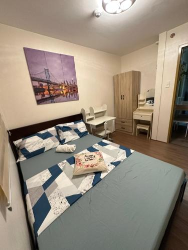 Postel nebo postele na pokoji v ubytování 8 Spatial - ForeverMC Condotel 2BR 5615