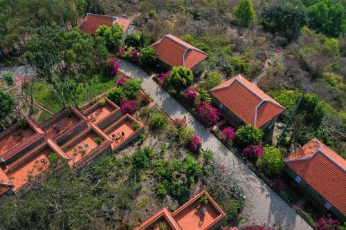 an overhead view of a house with flowers and plants at Victoria Nui Sam Lodge in Chau Doc