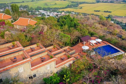 an aerial view of a house with a swimming pool at Victoria Nui Sam Lodge in Chau Doc