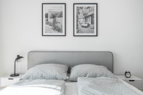 A bed or beds in a room at Whats-App Self-Check-IN - Pärchen Wohnung am Hauptbahnhof