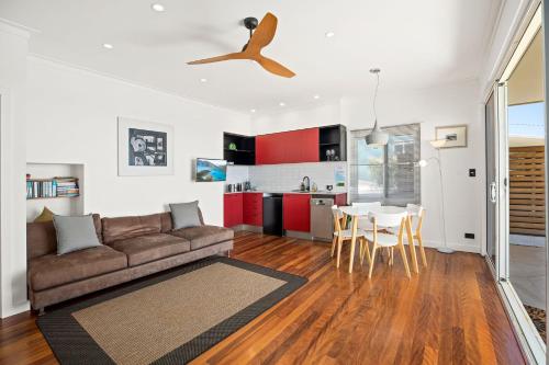 a living room with a couch and a table at Gagaal Lookout in Scotts Head