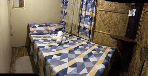 Tempat tidur dalam kamar di Alexandra's Transient Haus