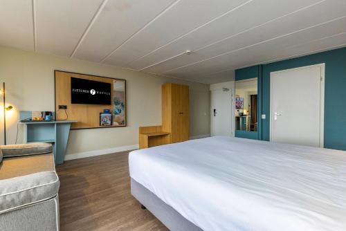 Letto o letti in una camera di Fletcher Hotel Restaurant Loosdrecht-Amsterdam