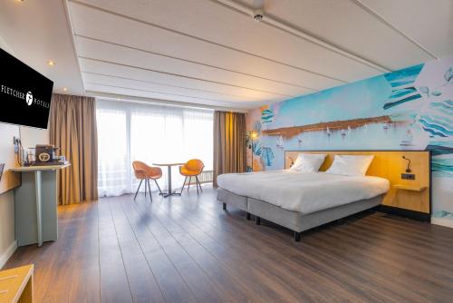 Letto o letti in una camera di Fletcher Hotel Restaurant Loosdrecht-Amsterdam