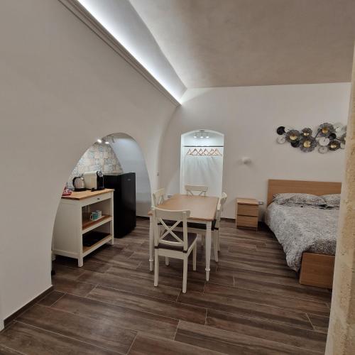 Postel nebo postele na pokoji v ubytování B&B Il Rosone