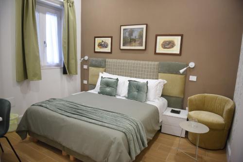 Letto o letti in una camera di Il giardino delle ninfee