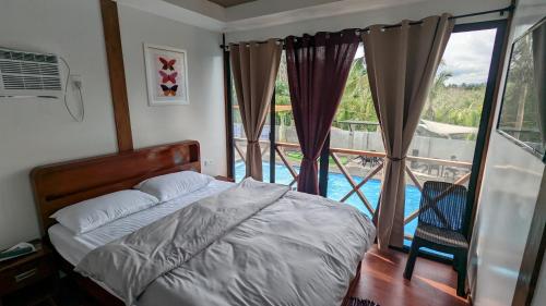 Postel nebo postele na pokoji v ubytování Bakawan Hideaway Resort and Restaurant